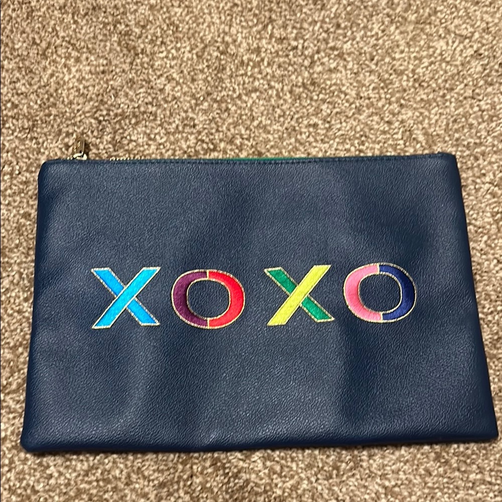C. Wonder Navy Leather Pouch